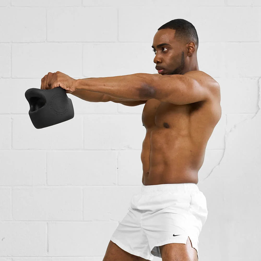 Athlete holding a Flowbell at arm’s length
